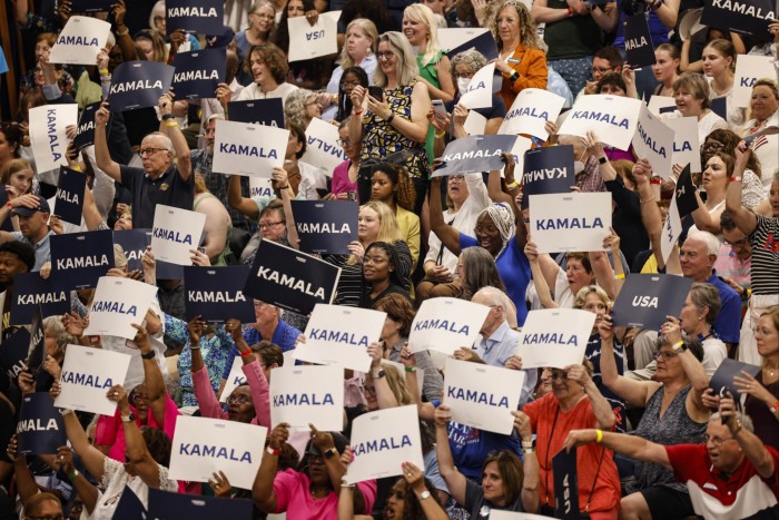 Supporters cheer and hold signs at a rally for Kamala Harris in West Allis, Wisconsin 