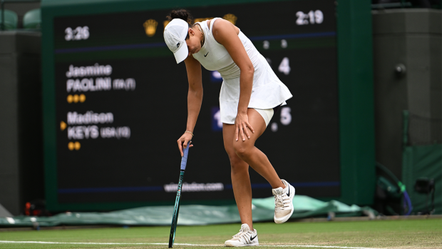 Madison Keys pulls up lame during her women's singles match against Jasmine Paolini.