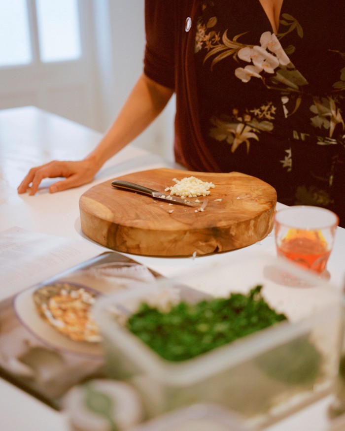 A close up image of a cutting board and knife