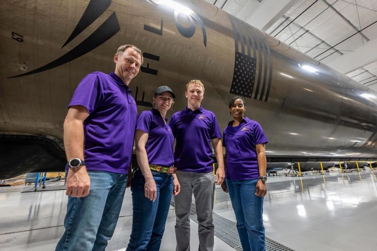 NASA’s SpaceX Crew-9 Stands in Front of a Falcon 9 First-Stage Booster