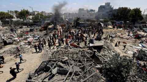 The aftermath of an Israeli airstrike which killed 90 Palestinians in Al-Mawasi, a designated ‘safe zone’ in Gaza, on 13 July