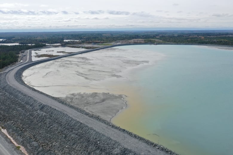 A wall made of rock contains liquid and other materials at the Touquoy mine.