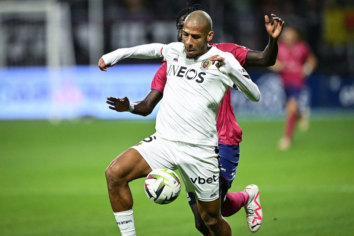 Defender Jean-Clair Todibo, front, from Ineos-owned OGC Nice fights for the ball during a French Ligue 1 football match 