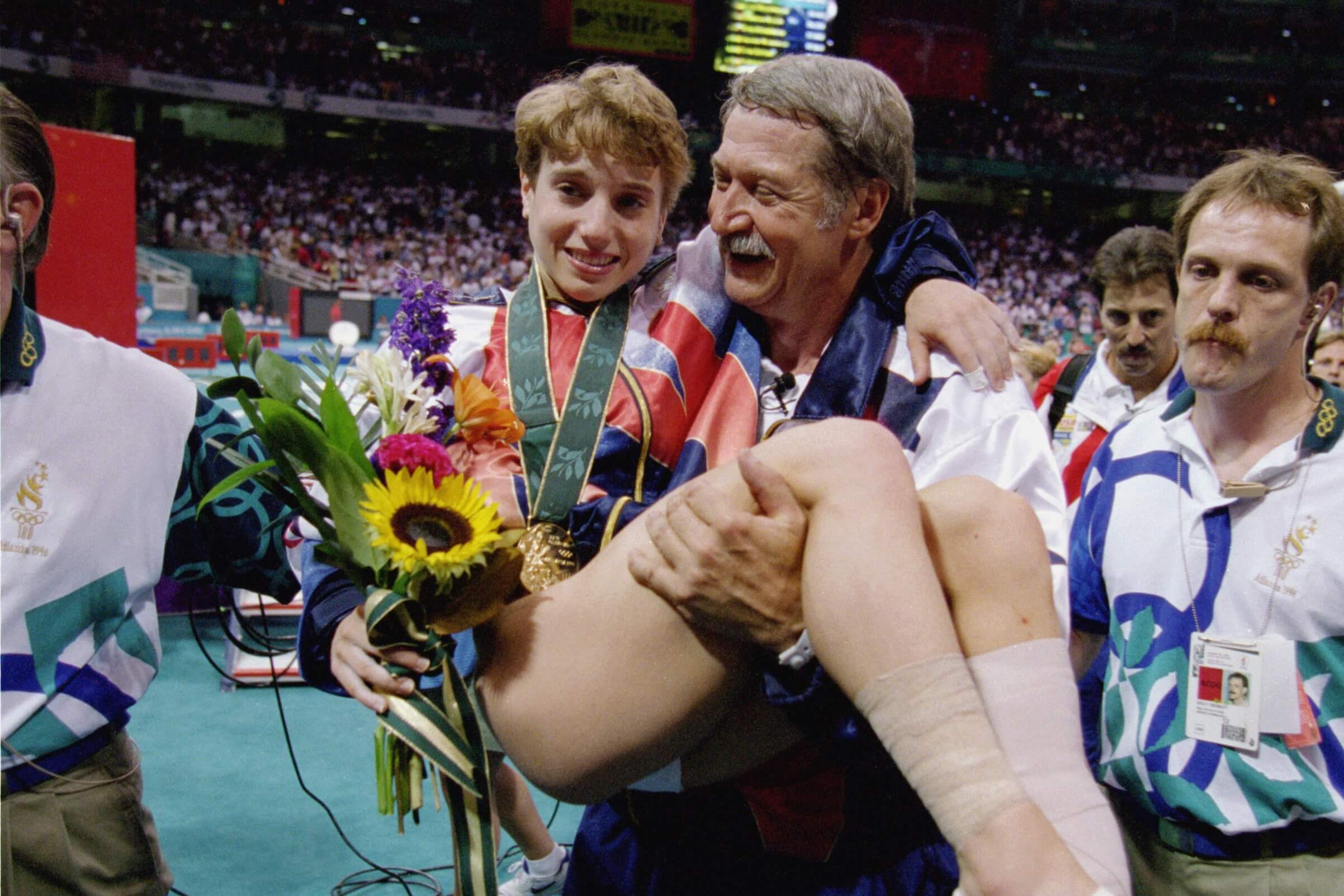 Kerri Strug and Bela Karolyi