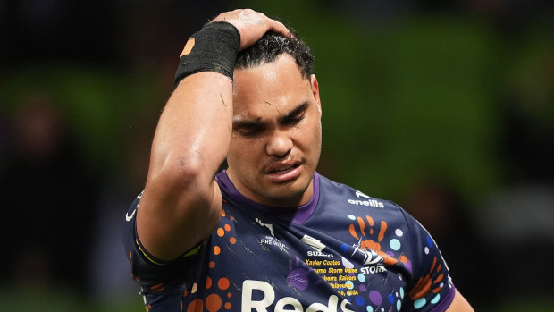 Xavier Coates of the Storm leaves the field with an injury during the round 17 NRL match between Melbourne Storm and Canberra Raiders at AAMI Park, on June 29, 2024, in Melbourne, Australia. (Photo by Daniel Pockett/Getty Images)