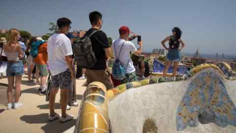 Tourists in Barcelona’s Parc Güell, which brought in online ticketing to help manage crowds