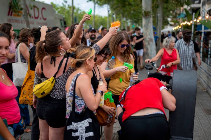 Protesters target tourists with water guns in Barcelona this month