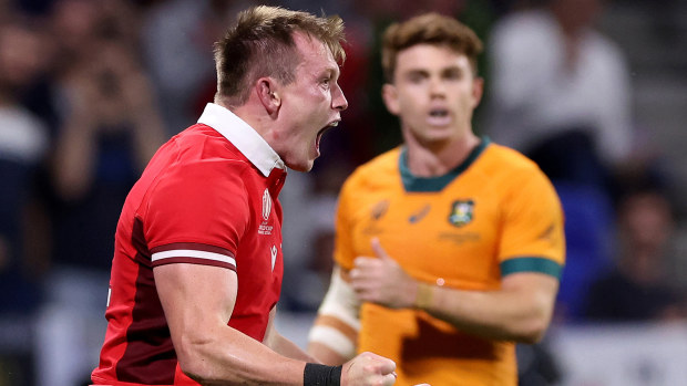 Nick Tompkins of Wales celebrates scoring his team's second try during the Rugby World Cup in Lyon.