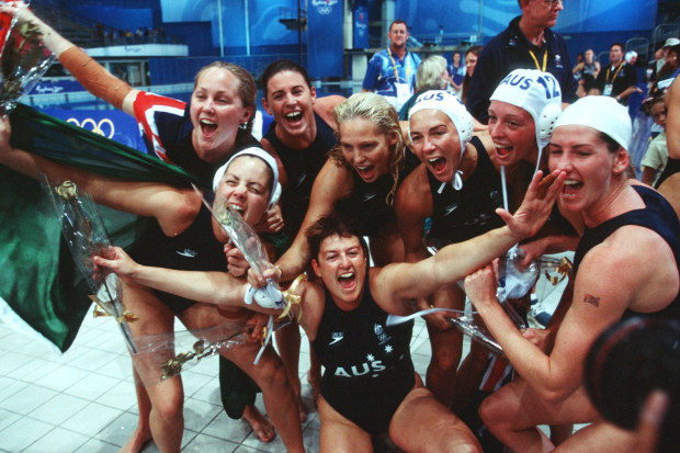 Australia celebrates winning water polo gold.