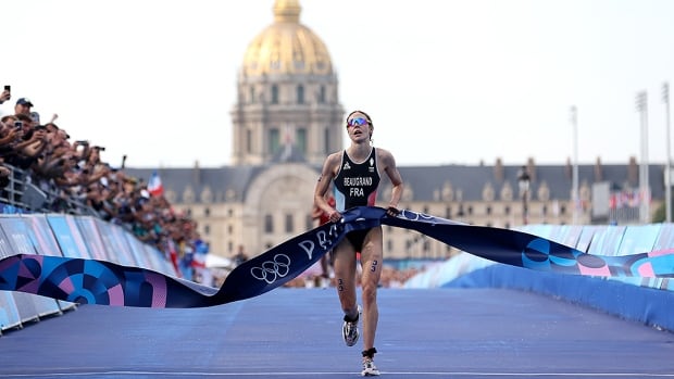 Victorious Beaugrand thrills home crowd with France’s 1st individual Olympic triathlon medal