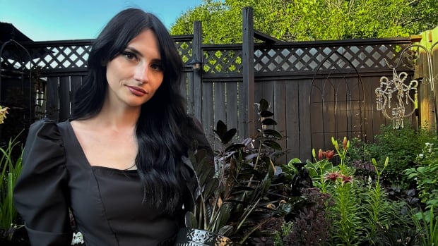 Dark flowers thriving in backyard ‘goth garden’