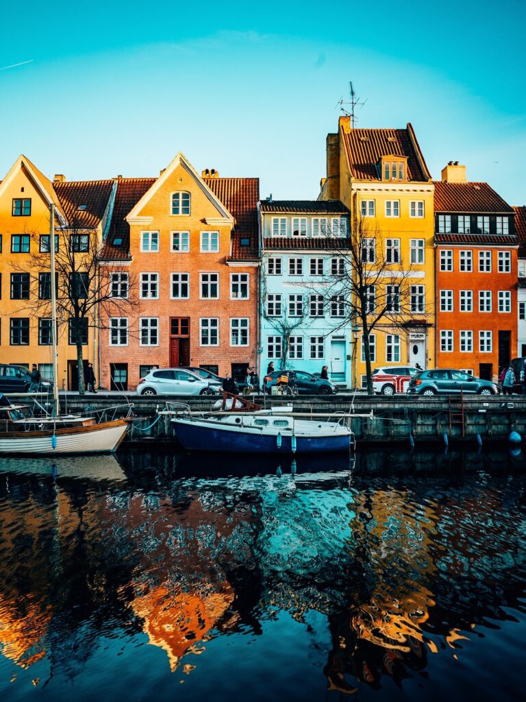 Research shows fishing boats in the harbor haul tourists into Danish hotels