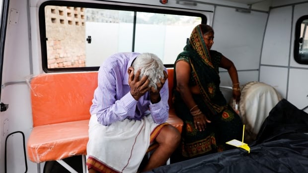 Overcrowding, bad weather may have contributed to deadly stampede in northern India, police say