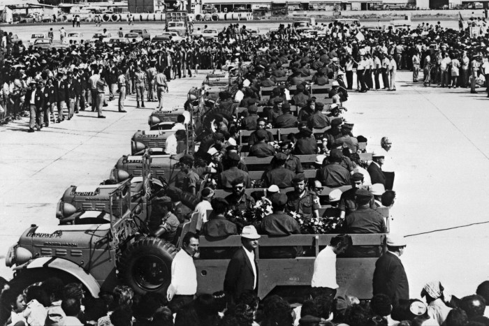 Coffins of Israeli olympic team victims of the Palestinian hostage-taking are transported on military vehicules at Lof airport, Israel, in 1972