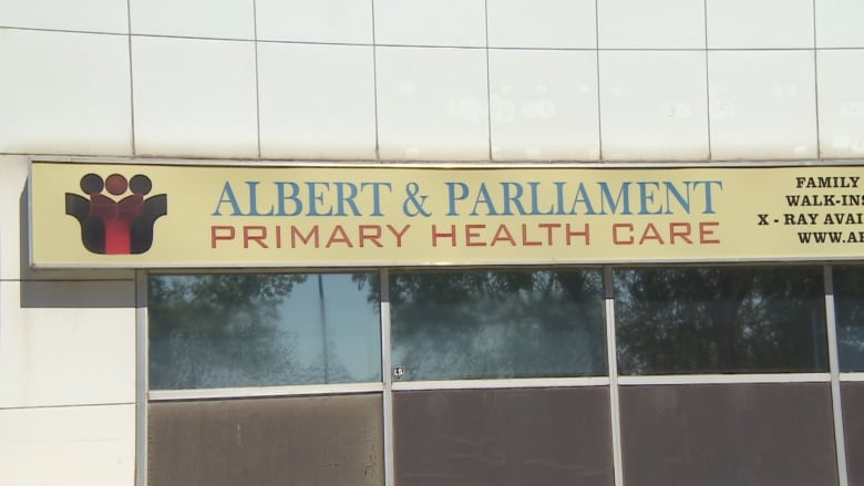 A sign is displayed over the windows. The sign has the phrase "Albert & Parliament Primary Health Care" on it. 