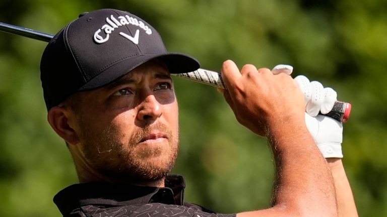 Xander Schauffele hits from the 12th tee during the first round of the Tour Championship golf tournament, Thursday, Aug. 29, 2024, in Atlanta. (AP Photo/Mike Stewart)