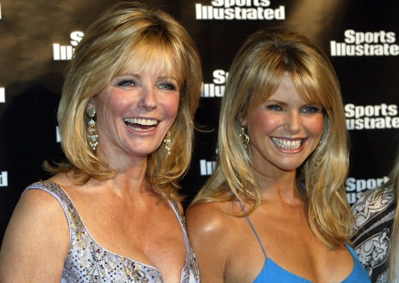 Former Sports Illustrated swimsuit models Cheryl Tiegs, left, and Christie Brinkley at an event to promote the magazine's 2004 swimsuit issues. 