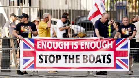 An anti-immigration demonstration near parliament on July 31 in response to the fatal stabbing of three children in Stockport