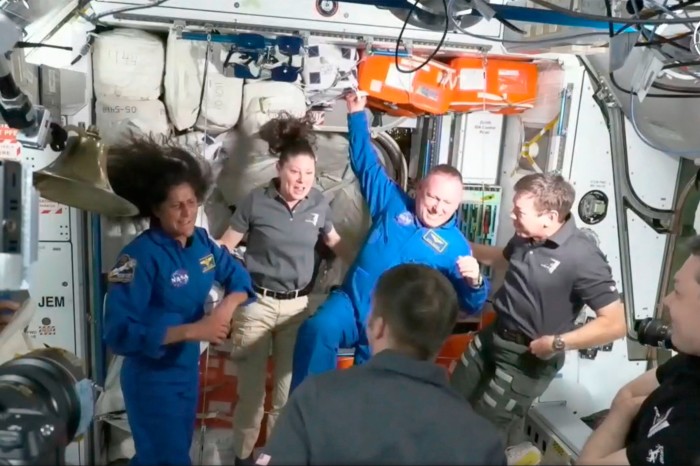 Nasa astronauts Sunita Williams and Barry Wilmore are greeted by the crew of the International Space Station on Thursday, June 6 2024