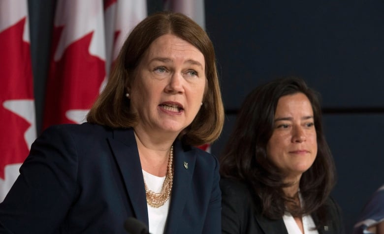 Jane Philpott, seen here with Jody Wilson-Raybould in 2016, resigned from cabinet on March 4. 