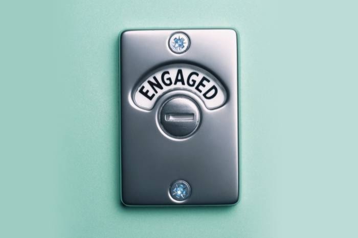 A lavatory lock showing the word ‘Engaged’