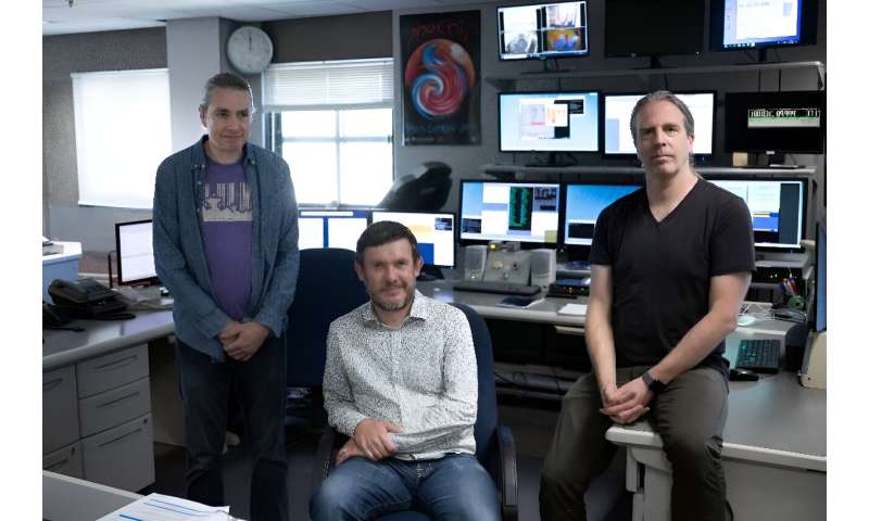 David MacMahon, Breakthrough Listen Initiative Chief Engineer, Steve Croft, Breakthrough Listen Initiative Project Scientist, and Matt Lebofsky, Breakthrough Listen Initiative Lead System Administrator, pose for a portrait in the control room for the Gree