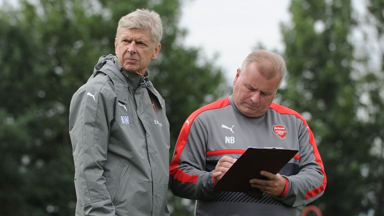 Arsenal manager Arsene Wenger with 1st team coach Neil Banfield during a training session on August 10, 2016 in St Albans