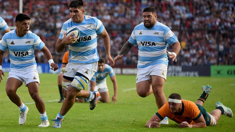 Argentina's Los Pumas Joaquin Oviedo runs with the ball to score a try against Australia during a rugby championship test match in Santa Fe, Argentina, Saturday, Sept. 7, 2024. (AP Photo/Mateo Occhi) 