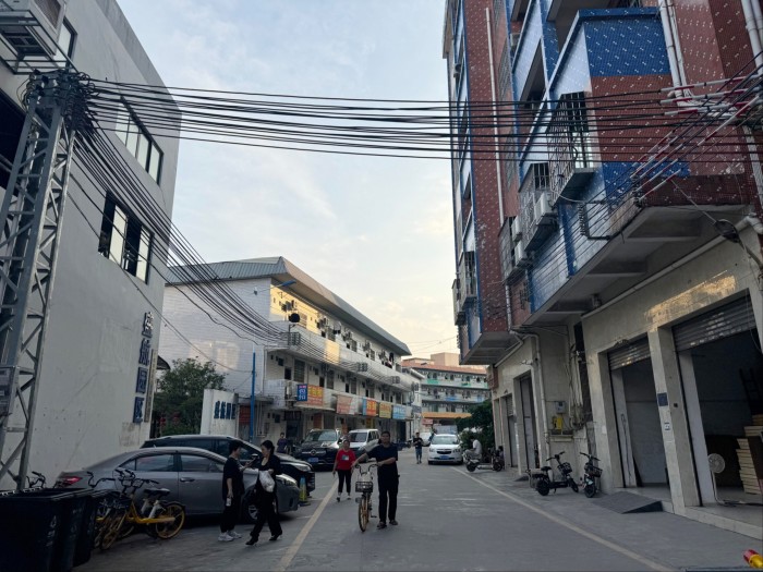 A street in Panyu showing buildings and residents