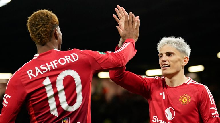 Manchester United's Alejandro Garnacho celebrates with Marcus Rashford after scoring the fourth goal against Barnsley