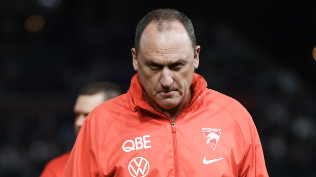 Swans coach John Longmire, looks dejected after that round 21 loss.