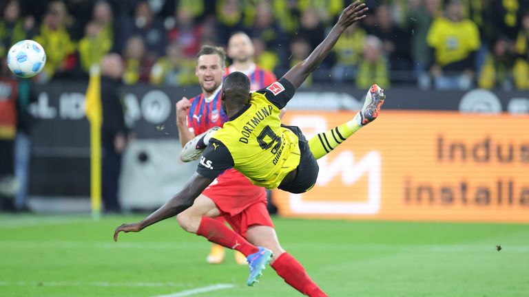 Serhou Guirassy fires off an acrobatic shot on his Borussia Dortmund debut against Heidenheim