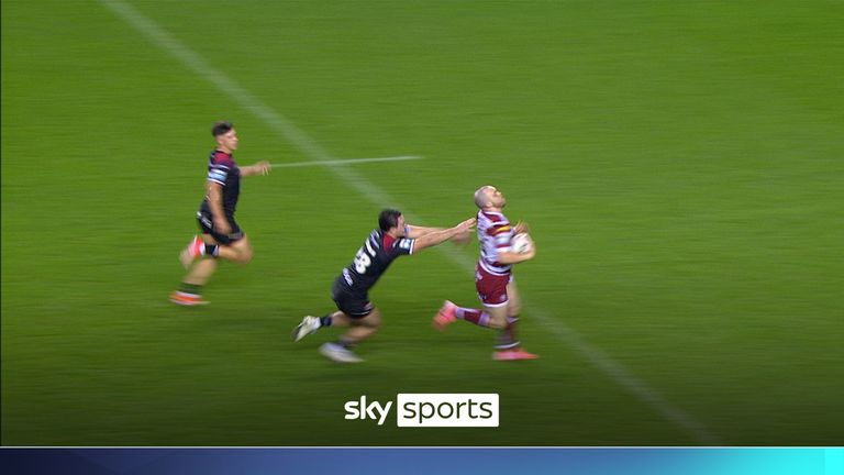 Wigan Warriors' Liam Marshall gets his second try of the evening against Salford Red Devils.