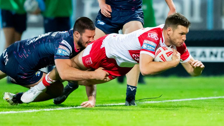 Picture by Allan McKenzie/SWpix.com - 20/09/2024 - Rugby League - Betfred Super League Round 27 - Hull KR v Leeds Rhinos - Sewell Group Craven Park, Hull, England - Hull KR's Tom Opacic scores a try against Leeds.