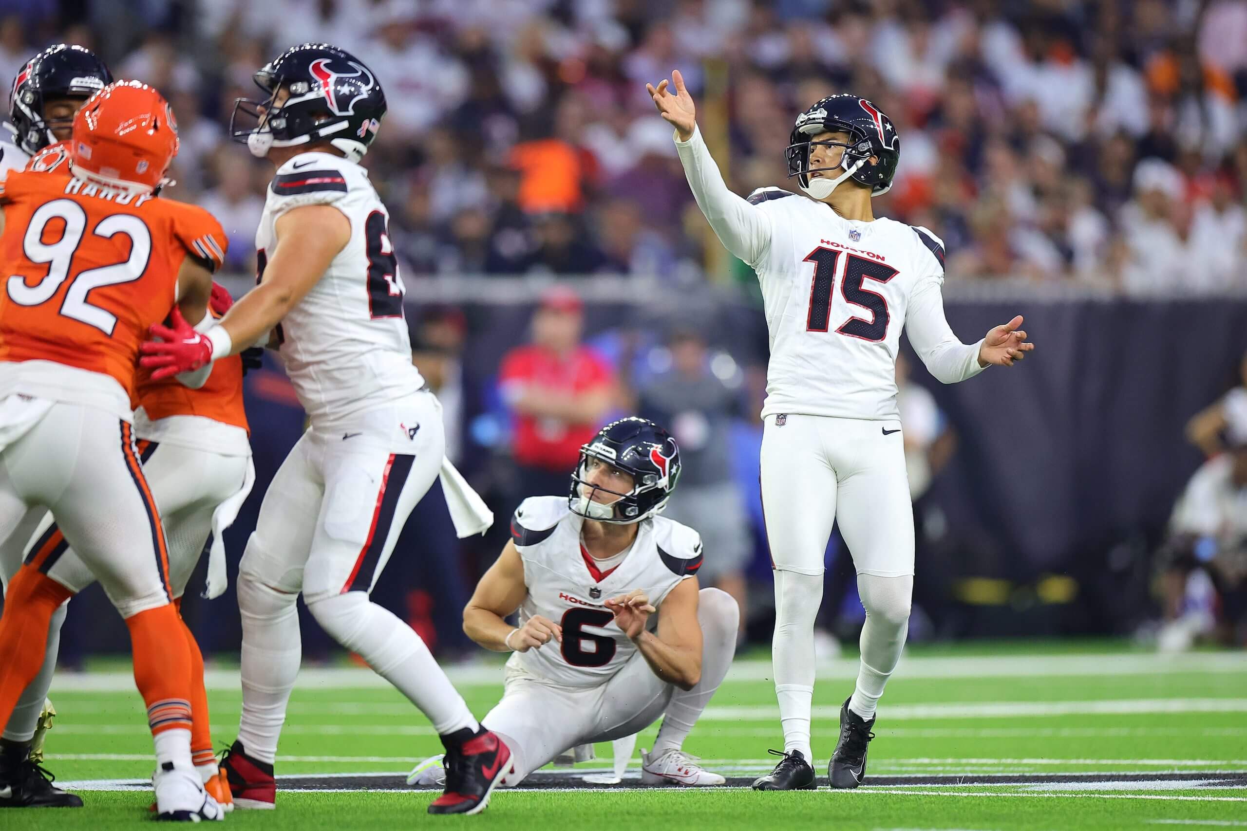 Kicker Ka'imi Fairbairn of the Houston Texans kicks a field goal during the first quarter against the Chicago Bears at NRG Stadium on September 15, 2024 in Houston, Texas.