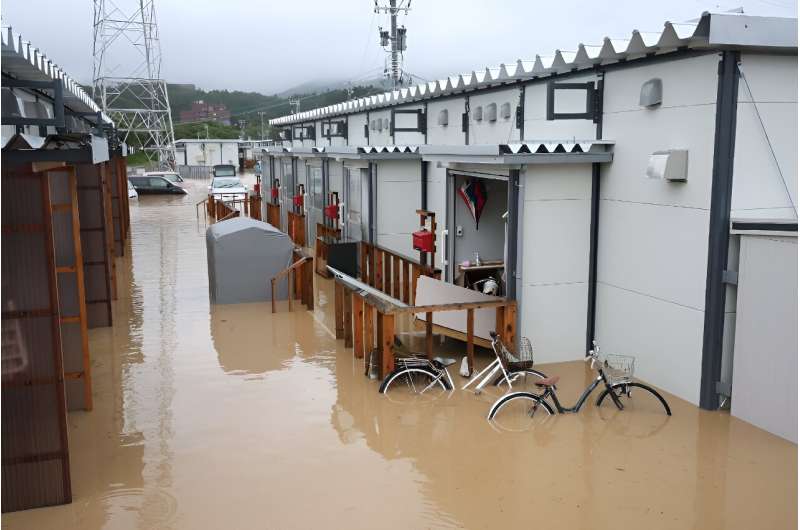 Flood waters inundate temporary housing complexes built for people who lost their homes during the January 1 earthquake