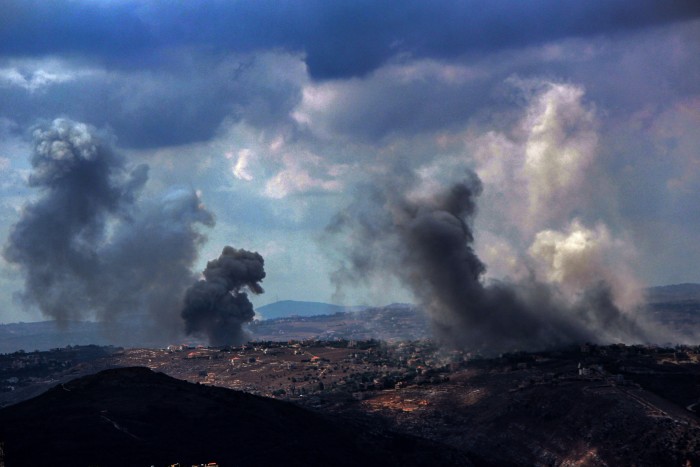 Smoke from heavy Israeli air raids billows from the southern Lebanese village of Taybeh