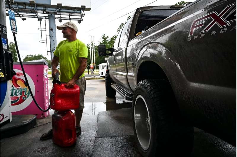 John Lauper fills up on gas ahead of the arrival of Hurricane Helene in Panacea, Florida