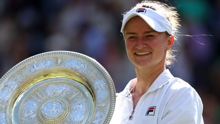 Barbora Krejcikova of Czechia poses with the Ladies' Singles Trophy following victory against Jasmine Paolini of Italy during her Ladies' Singles Final match during day thirteen of The Championships Wimbledon 2024 at All England Lawn Tennis and Croquet Club on July 13, 2024 in London, England. (Photo by Julian Finney/Getty Images)