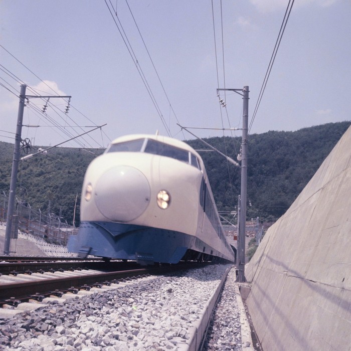 A train gliding along tracks