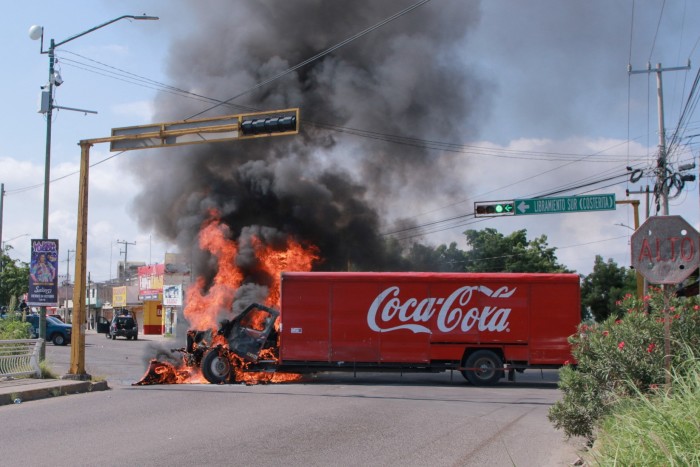 A truck on fire is seen on the streets of Culiacan, Sinaloa State, Mexico