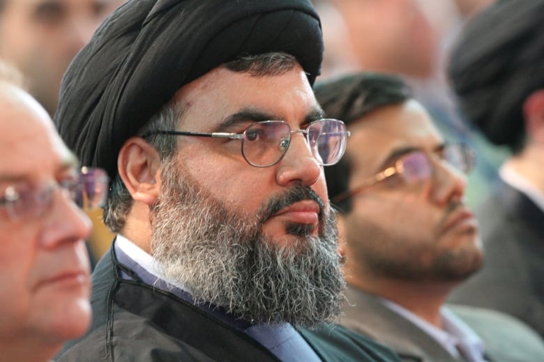 FILE PHOTO: Hezbollah leader Sayyed Hassan Nasrallah attends a graduation ceremony at a university run by the group in a Beirut suburb April 8, 2007. 