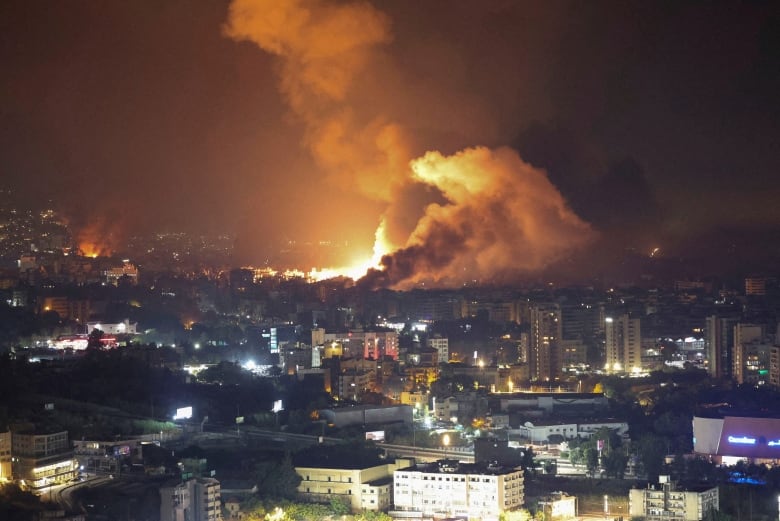 Smoke billows following Israeli strikes over Beirut's southern suburbs, amid ongoing hostilities between Hezbollah and Israeli forces, as seen from Sin El Fil, Lebanon, September 28, 2024.