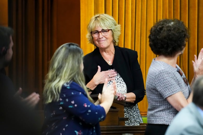 Candidate for Speaker and member of Parliament Carol Hughes is applauded after delivering a speech in the House of Commons prior to voting on Parliament Hill in Ottawa on Oct. 3, 2023.