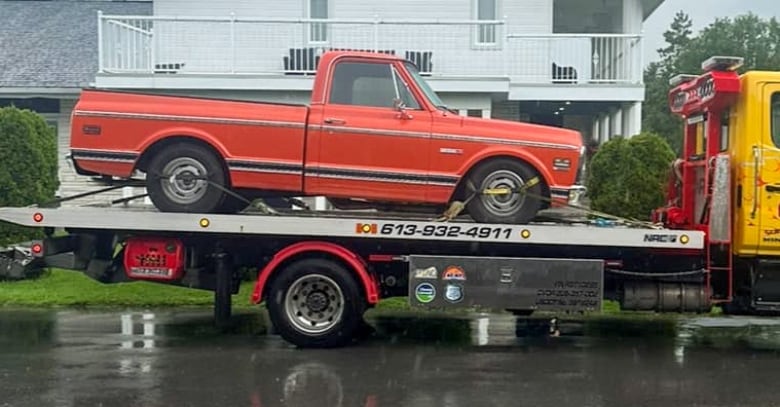 Roger Major's 1972 Chevy Cheyenne pickup truck being towed away in July 2024, under orders of the Ontario Provincial Police. The Alexandria, Ont. farmer had owned the truck for more than four years when it was declared to be stolen. 