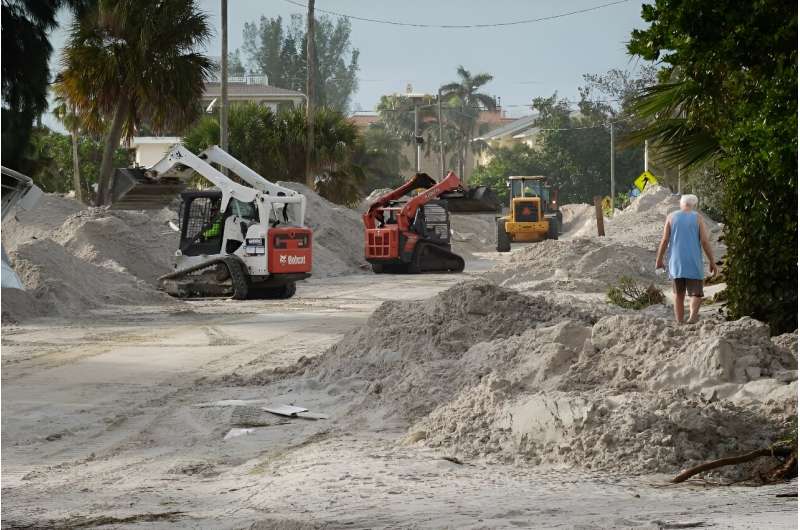 Local officials in Treasure Island have barred vehicles from coming onto the island while they proceed with clean-up efforts