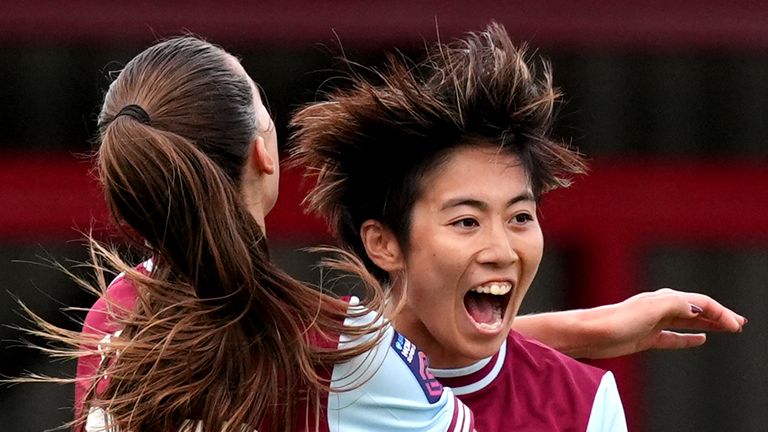 West Ham United's Riko Ueki (right) celebrates scoring their side's first goal of the game during the Barclays Women's Super League match at Chigwell Construction Stadium, Dagenham. Picture date: Sunday September 29, 2024.