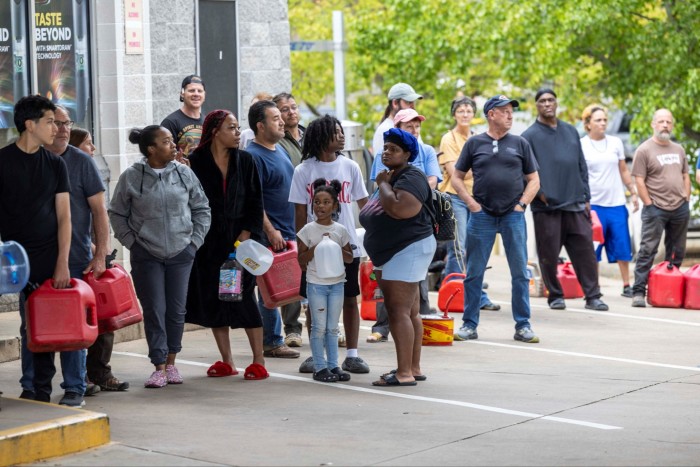 Asheville residents residents line up for petrol at a filling station in western North Carolina