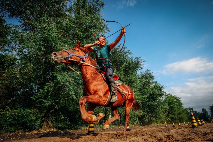 An archer on a galloping horse