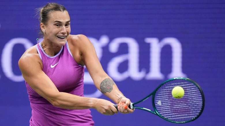 Belarus female tennis player returns a shot to American playeruring the women's singles final of the U.S. Open tennis championships, Saturday, Sept. 7, 2024, in New York. 